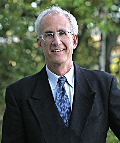 Dr. Maynard Brusman